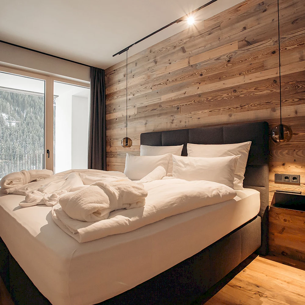 Beds to snuggle up and sleep in have at Ferienhaus Ischgl.